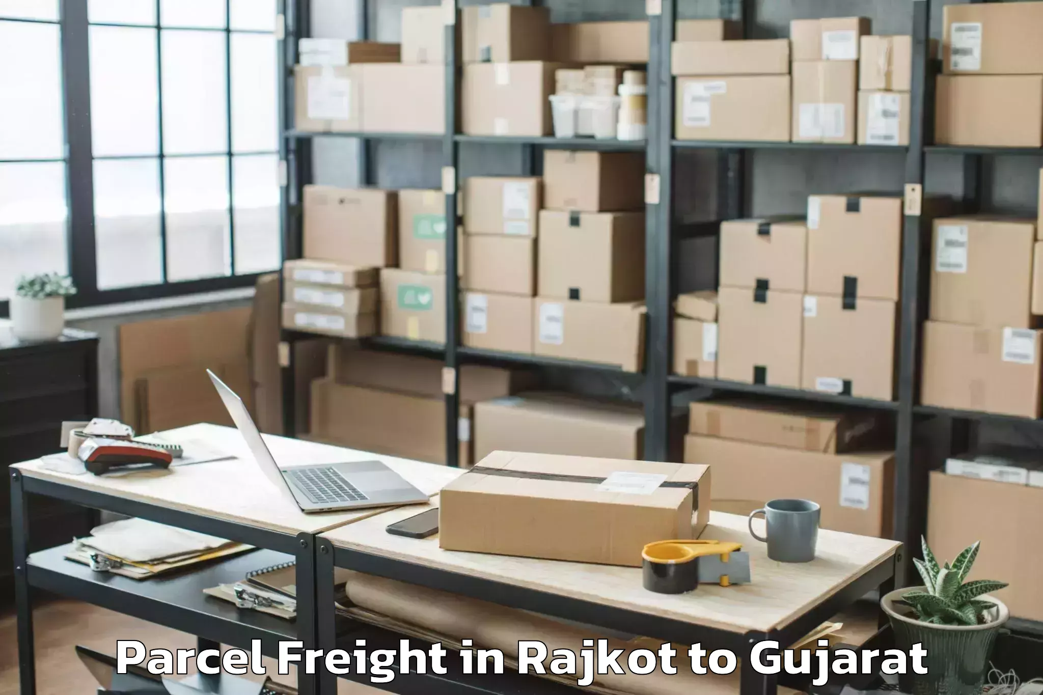 Leading Rajkot to Jhulasan Parcel Freight Provider